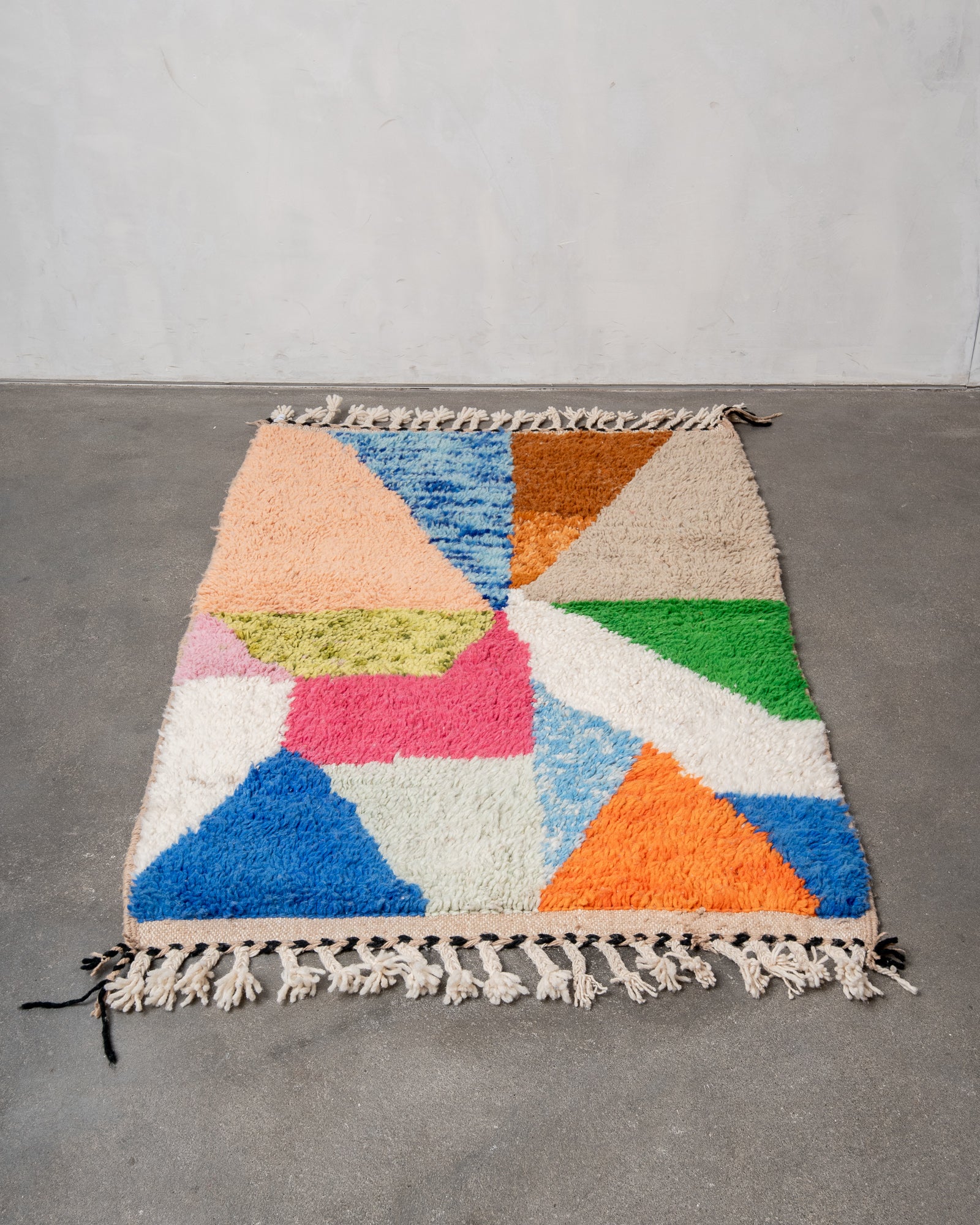 Modern, designer, handcrafted Berber rug from Morocco. Beniourain carpet with beautiful colours and patterns and fluffy wool texture.